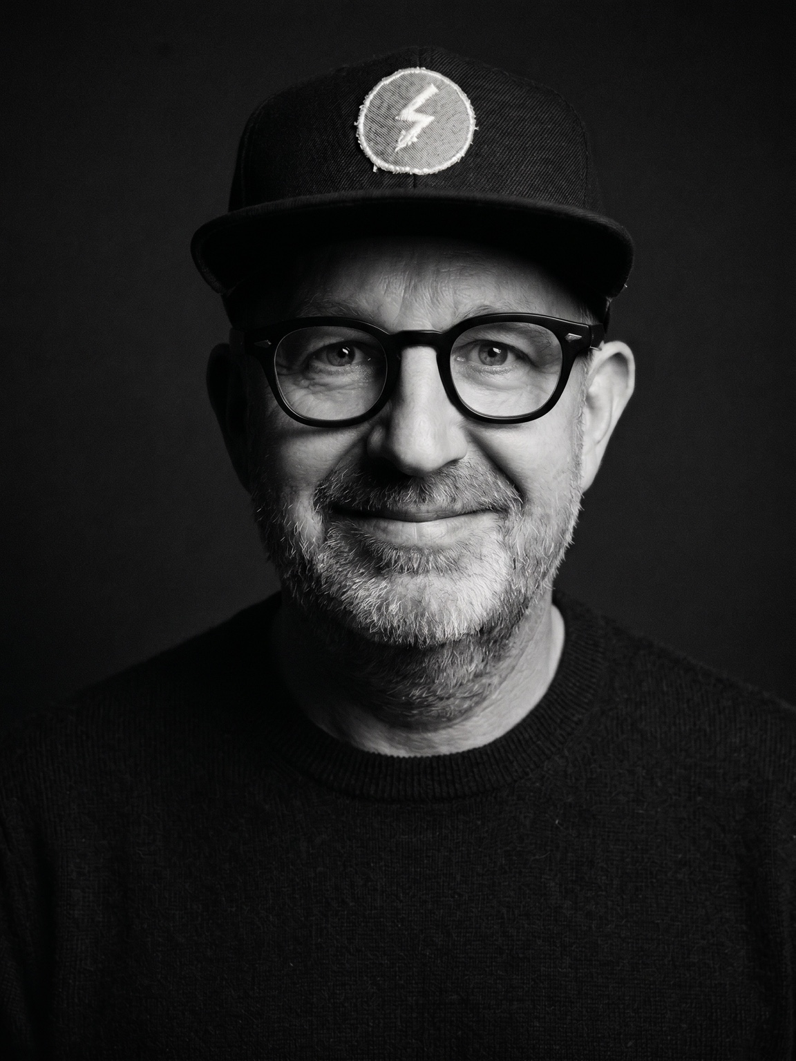 Tobias Fröhlich wearing glasses and his lightning-bolt cap